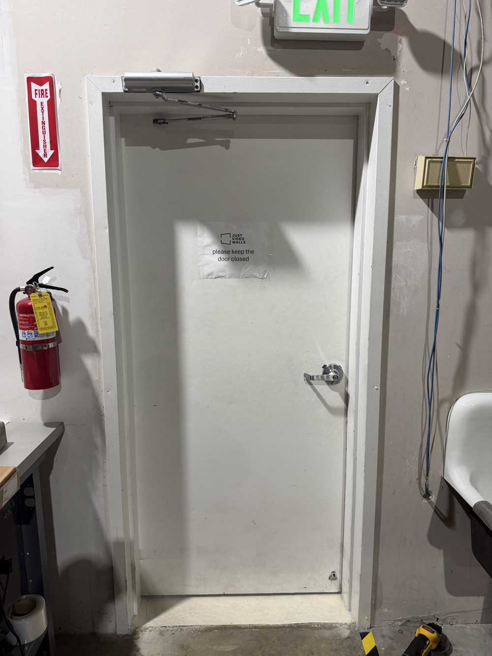 Fire-rated door with closer installed
