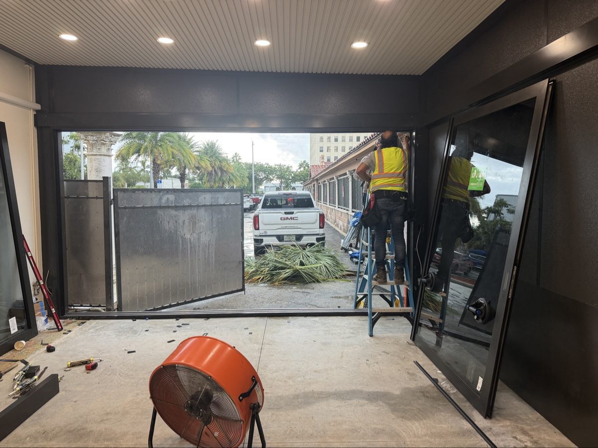 Impact sliding door installation in progress